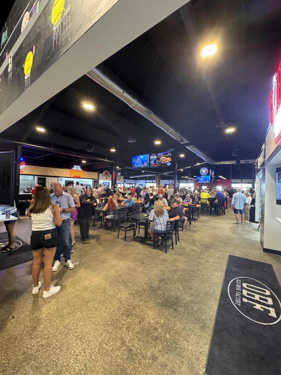 A full dining hall at Old Base Factory in O'Fallon, IL