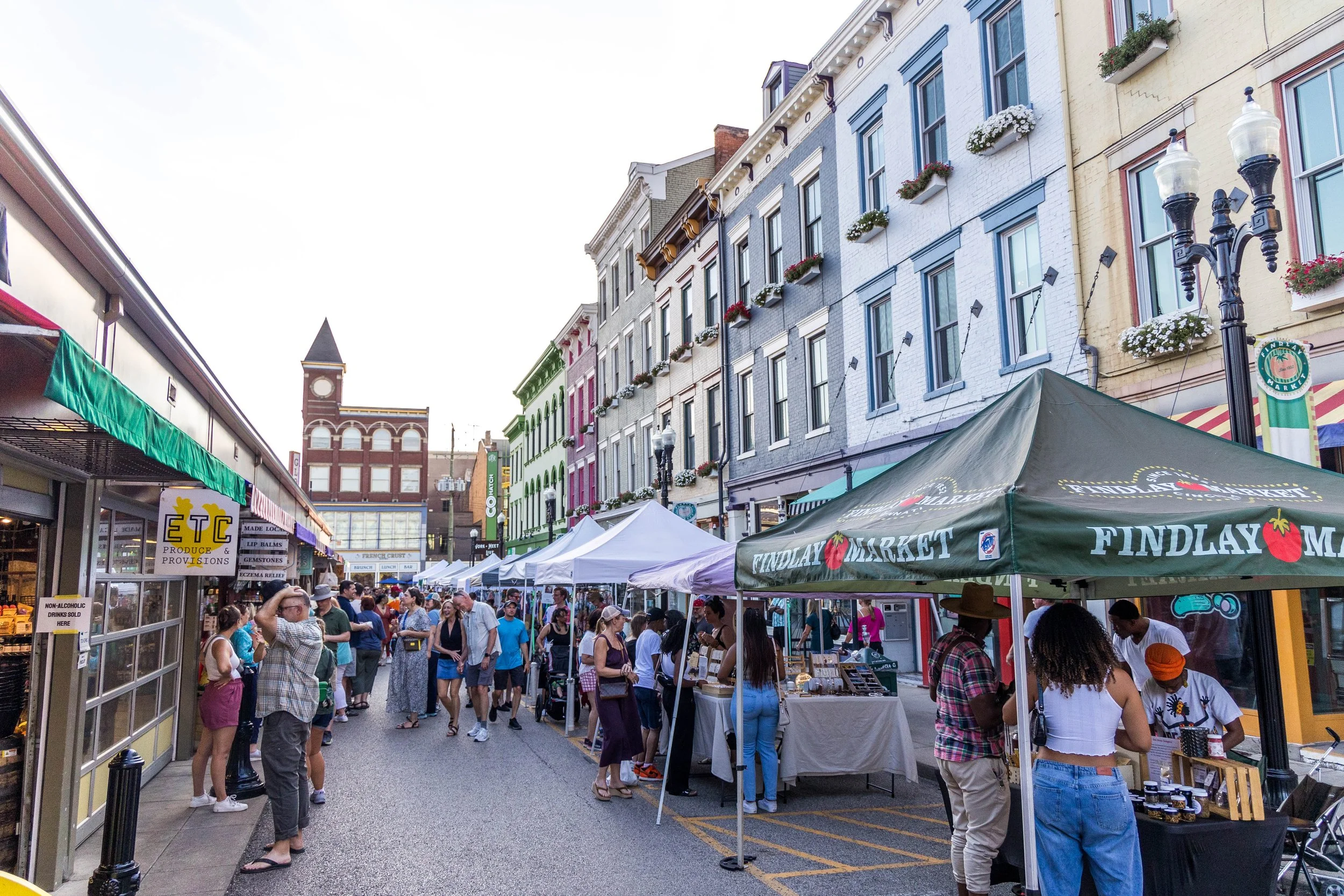 Outdoor market tents on the street beside Findlay Market