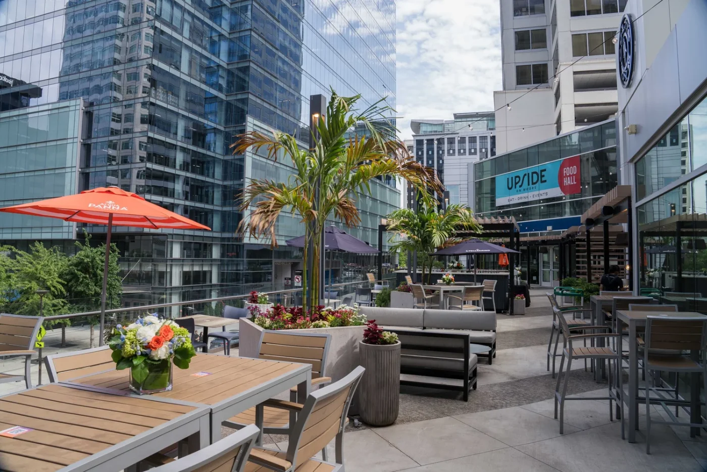 Outdoor terrace seating at UPSIDE on Moore in Rosslyn City Center