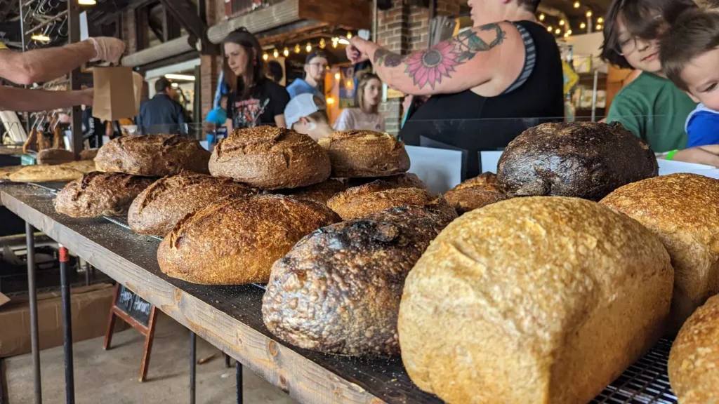 Loaves of fresh artisan bread on display at the 2nd Street Market in Dayton